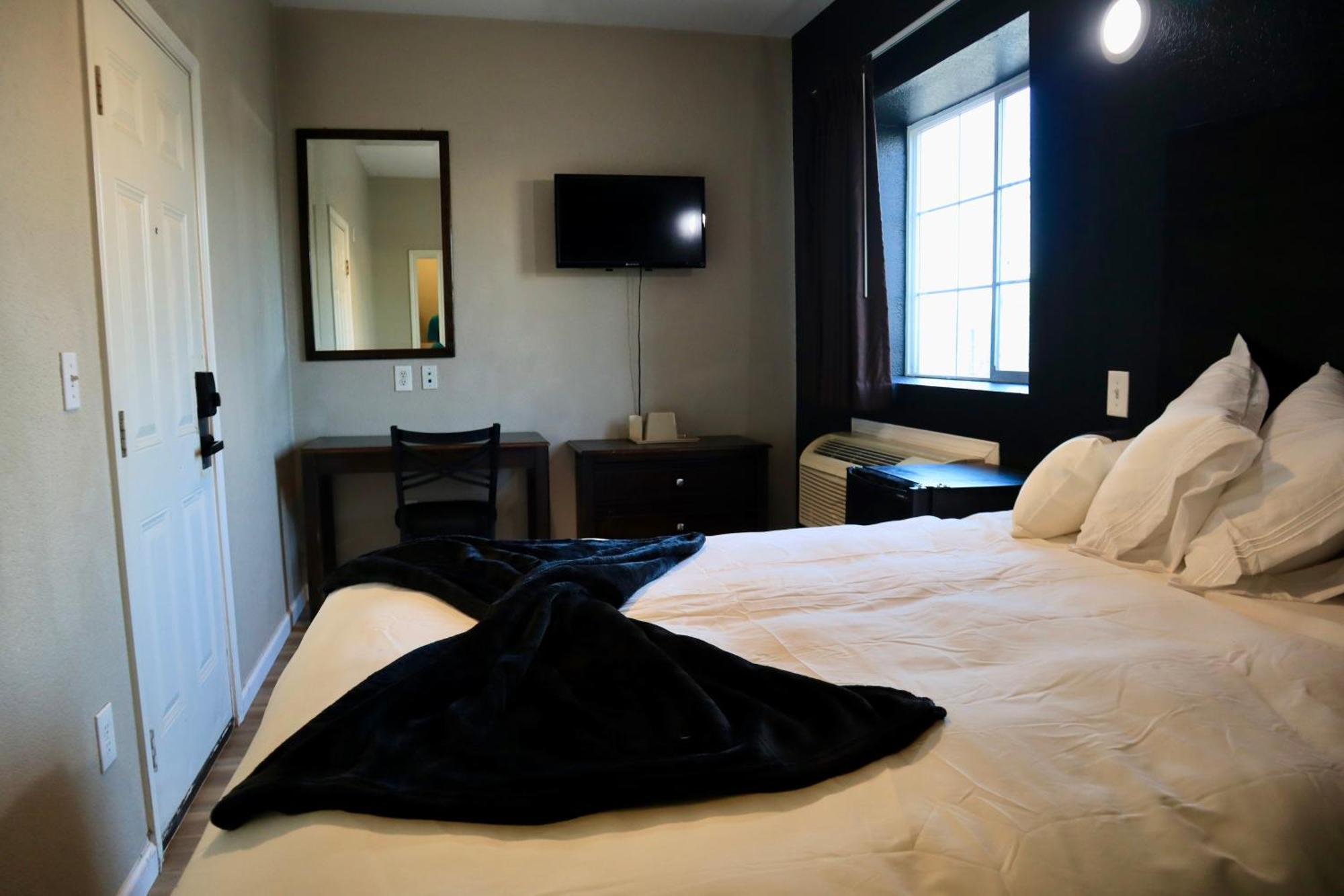 Hotel Dilley Grand Phòng bức ảnh